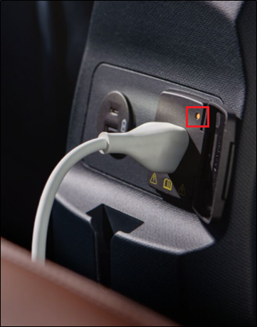 Rear center console of Ford Maverick with indictor light highlighted